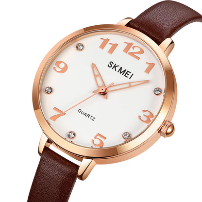 Elegant Analog Quartz Timepiece for women with Crystal Accents and Textured Strap