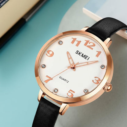 Elegant Analog Quartz Timepiece for women with Crystal Accents and Textured Strap