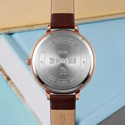 Elegant Analog Quartz Timepiece for women with Crystal Accents and Textured Strap
