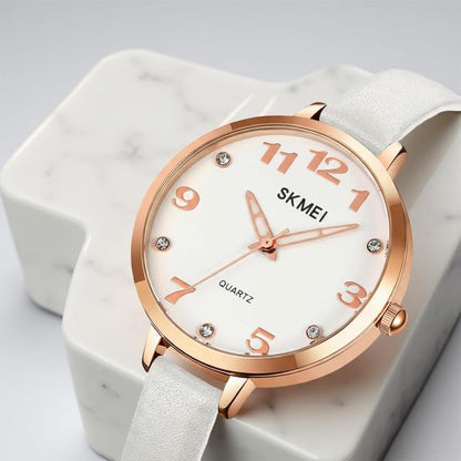 Elegant Analog Quartz Timepiece for women with Crystal Accents and Textured Strap