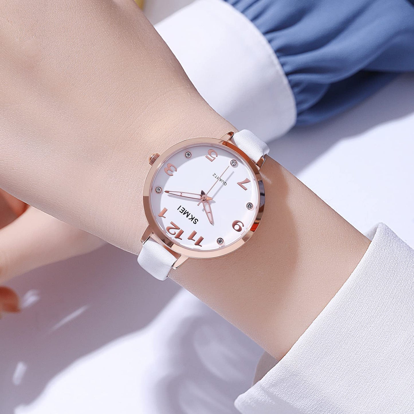 Elegant Analog Quartz Timepiece for women with Crystal Accents and Textured Strap